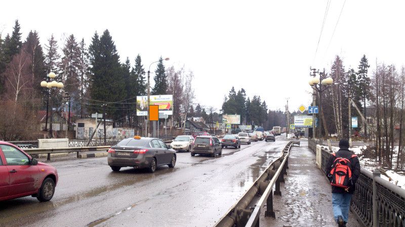 Фотография рекламного носителя, тип: Панель-кронштейн, адрес: Колтушское ш., поворот на ул. Минюшинская, Ленинградская область, Россия. Сторона ЛС №812486