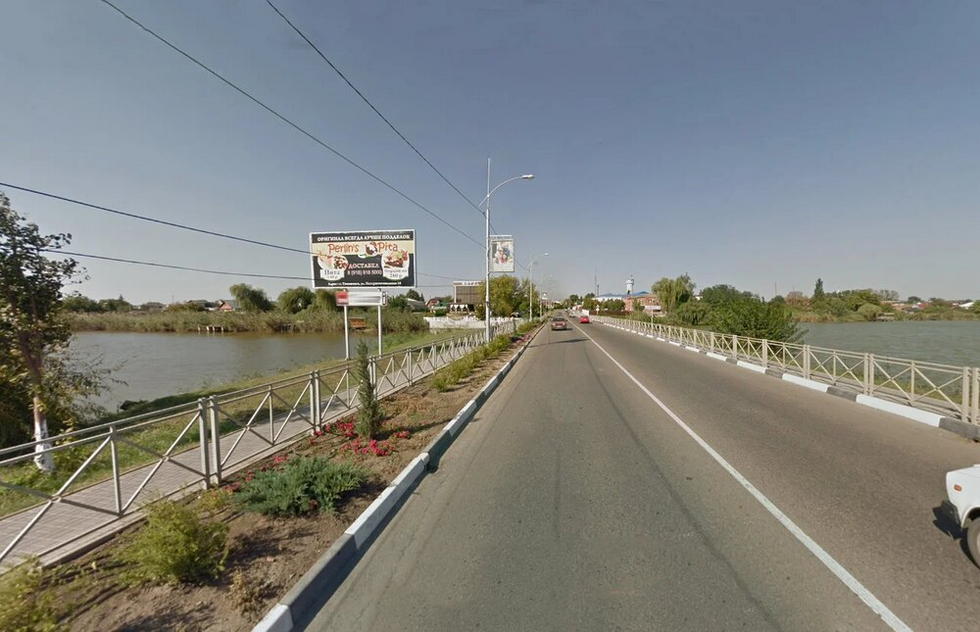 Фотография рекламного носителя, тип: Билборд 3x6, адрес: Красная ул., дамба р. Кирпили, Тимашёвск, Краснодарский край, Россия. Сторона Б №1026134