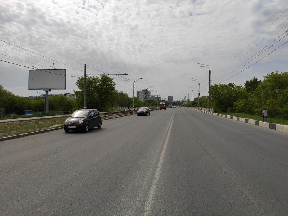 Фотография рекламного носителя, тип: Билборд 3x6, адрес: Урицкого ул., после моста через Свиягу, Ульяновск, Ульяновская область, Россия. Сторона Б №994139