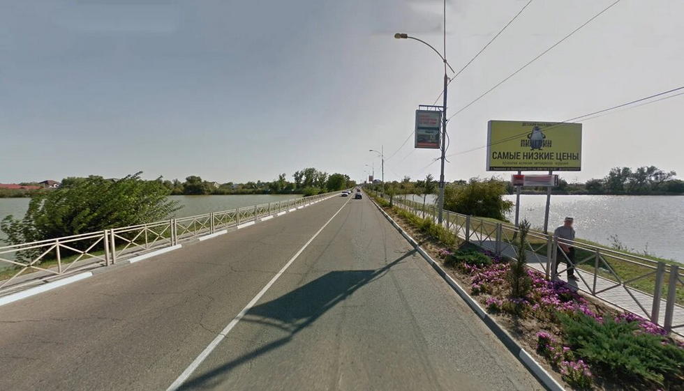 Фотография рекламного носителя, тип: Билборд 3x6, адрес: Красная ул., дамба р. Кирпили, Тимашёвск, Краснодарский край, Россия. Сторона А №1026133