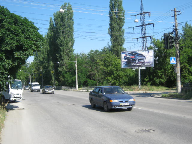 Фотография рекламного носителя, тип: Билборд 3x6, адрес: Воровского ул. Х Неапольская ул., Симферополь, Республика Крым, Россия. Сторона A №412136