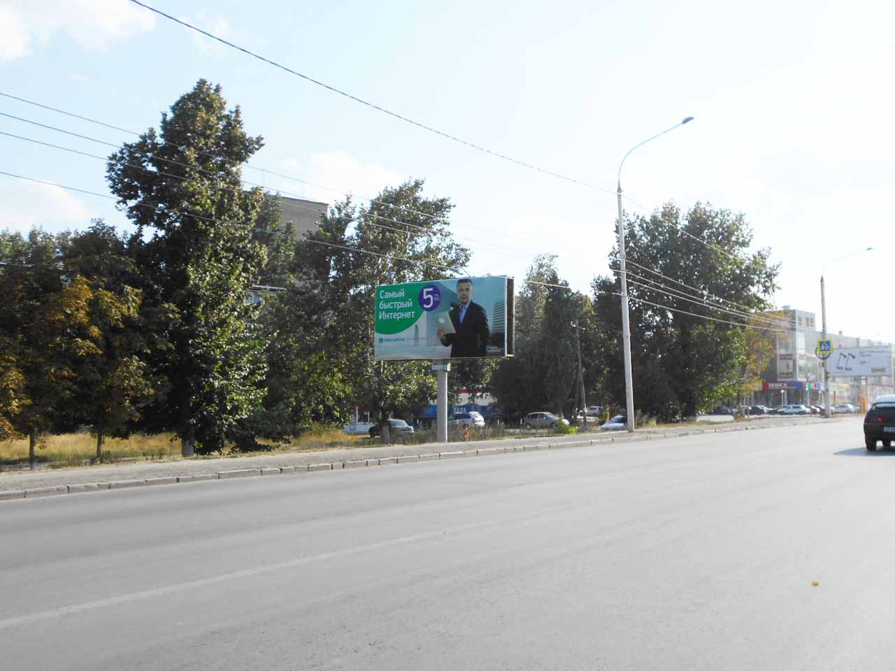 Фотография рекламного носителя, тип: Билборд 3x6, адрес: Баклановский пр-т., д.95, поз.2, Новочеркасск, Ростовская область, Россия. Сторона Б №1093226