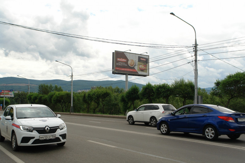 Фотография рекламного носителя, тип: Билборд 3x6, адрес: Коммунальный мост, поз.1, Красноярск, Красноярский край, Россия. Сторона А1-А3 №1324679
