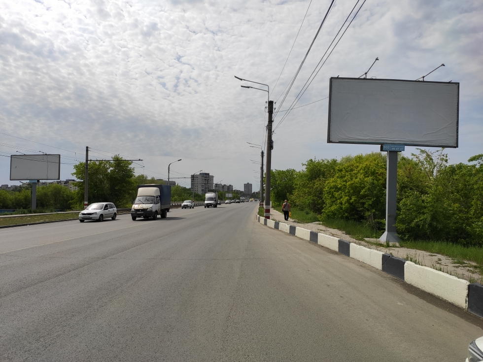 Фотография рекламного носителя, тип: Билборд 3x6, адрес: Урицкого ул., перед мостом через Свияга р., Ульяновск, Ульяновская область, Россия. Сторона A №994137