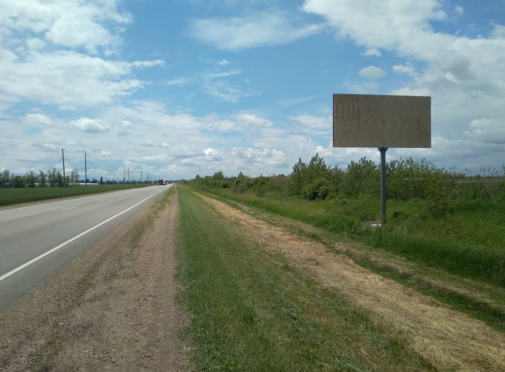 Фотография рекламного носителя, тип: Билборд 3x6, адрес: Тимашевск-Полтавская а/д, 27 680м, Краснодарский край, Россия. Сторона A №983956