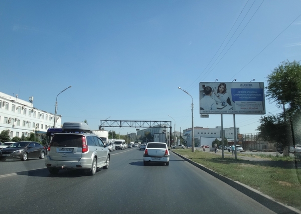 Фотография рекламного носителя, тип: Билборд 3x6, адрес: Николая Островского ул., поз.1, Астрахань, Астраханская область, Россия. Сторона А №1057829