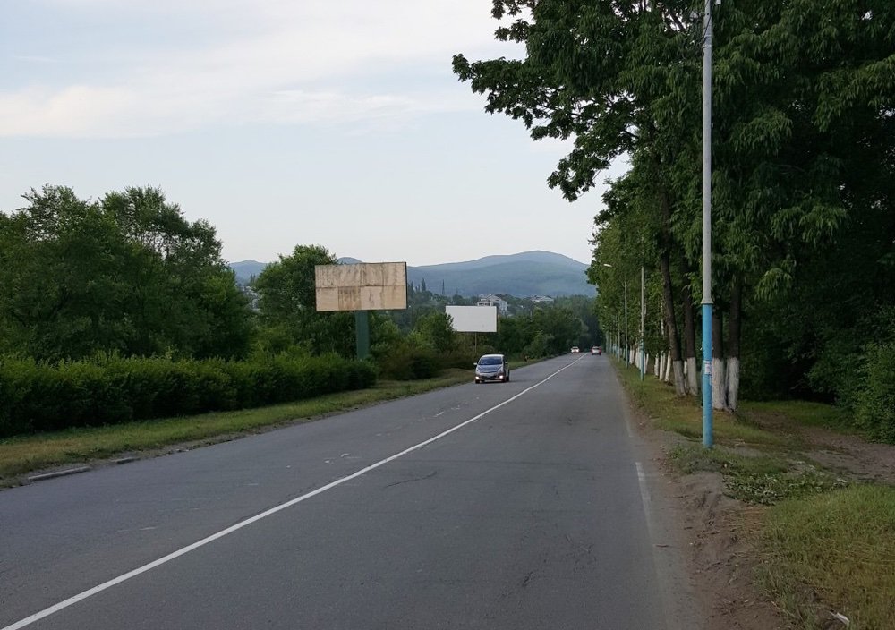 Фотография рекламного носителя, тип: Билборд 3x6, адрес: Партизанск г., Партизанская ул.,8, Владивосток, Приморский край, Россия. Сторона Б №756843