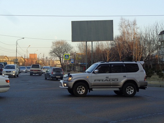 Фотография рекламного носителя, тип: Билборд 3x6, адрес: Чичеринаул., д.126, Уссурийск, Приморский край, Россия. Сторона А №791371