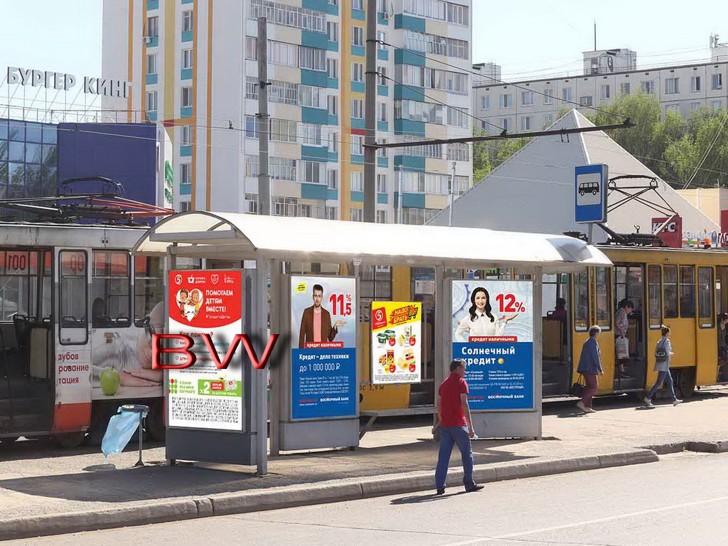 Фотография рекламного носителя, тип: Остановка, адрес: Вахитова пр-т., ост. Магазин Глобус, Набережные Челны, Республика Татарстан, Россия. Сторона BW №1007130