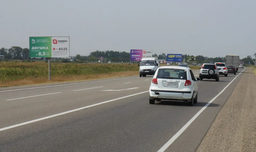 Фотография рекламного носителя, тип: Билборд 3x6, адрес: Краснодар - Славянск-на-Кубани - Крым а/д., 21 495м, Краснодар, Краснодарский край, Россия. Сторона Б №1028172