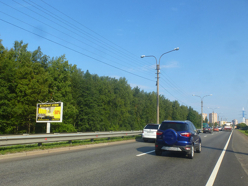 Фотография рекламного носителя, тип: Билборд 3x6, адрес: Приморское ш., д.261, Санкт-Петербург, Россия. Сторона B №1094485