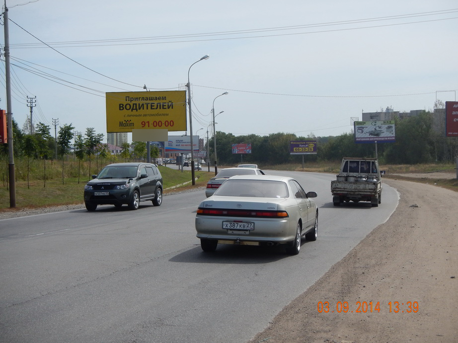 Фотография рекламного носителя, тип: Билборд 3x6, адрес: Промышленная ул. Х Луговая ул., поз.1, Хабаровск, Хабаровский край, Россия. Сторона Б №482498