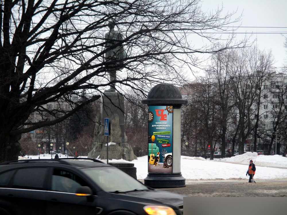 Фотография рекламного носителя, тип: Пиллар 3x1.4, адрес: Горького пл. Х Б. Покровская ул., д.65, Нижний Новгород, Нижегородская область, Россия. Сторона А1 №582903