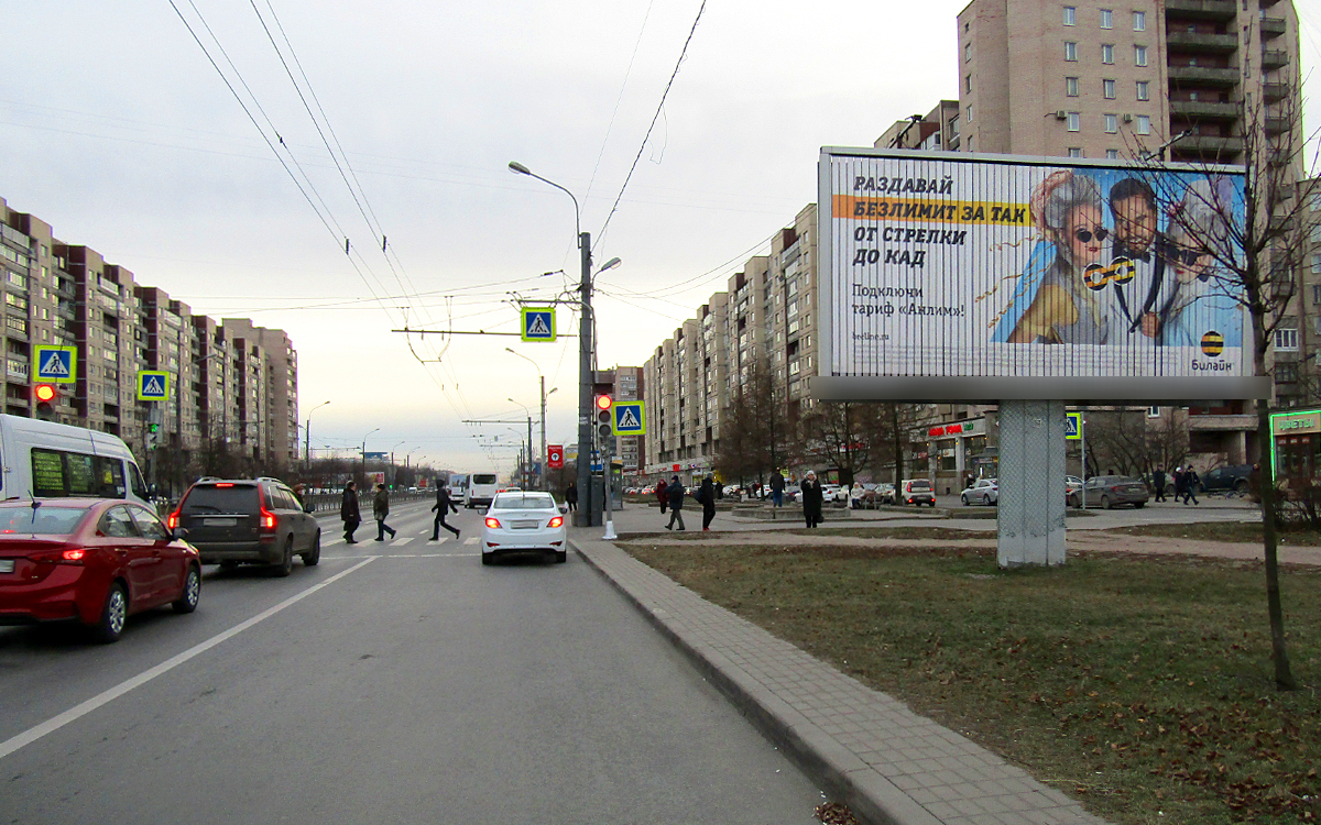 Фотография рекламного носителя, тип: Билборд 3x6, адрес: Большевиков пр-т., д.7, корп.1, Санкт-Петербург, Россия. Сторона A №546144