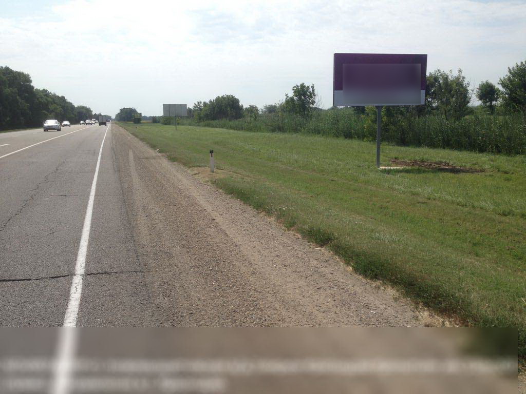 Фотография рекламного носителя, тип: Билборд 3x6, адрес: Новомышастовская станица, Краснодар-Темрюк а/д, 26 000м, Краснодарский край, Россия. Сторона A №630413