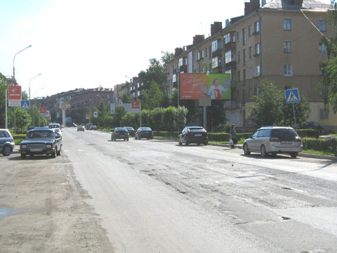 Фотография рекламного носителя, тип: Билборд 3x6, адрес: Строителей пр-т., д.13, Нижний Тагил, Свердловская область, Россия. Сторона A №483615