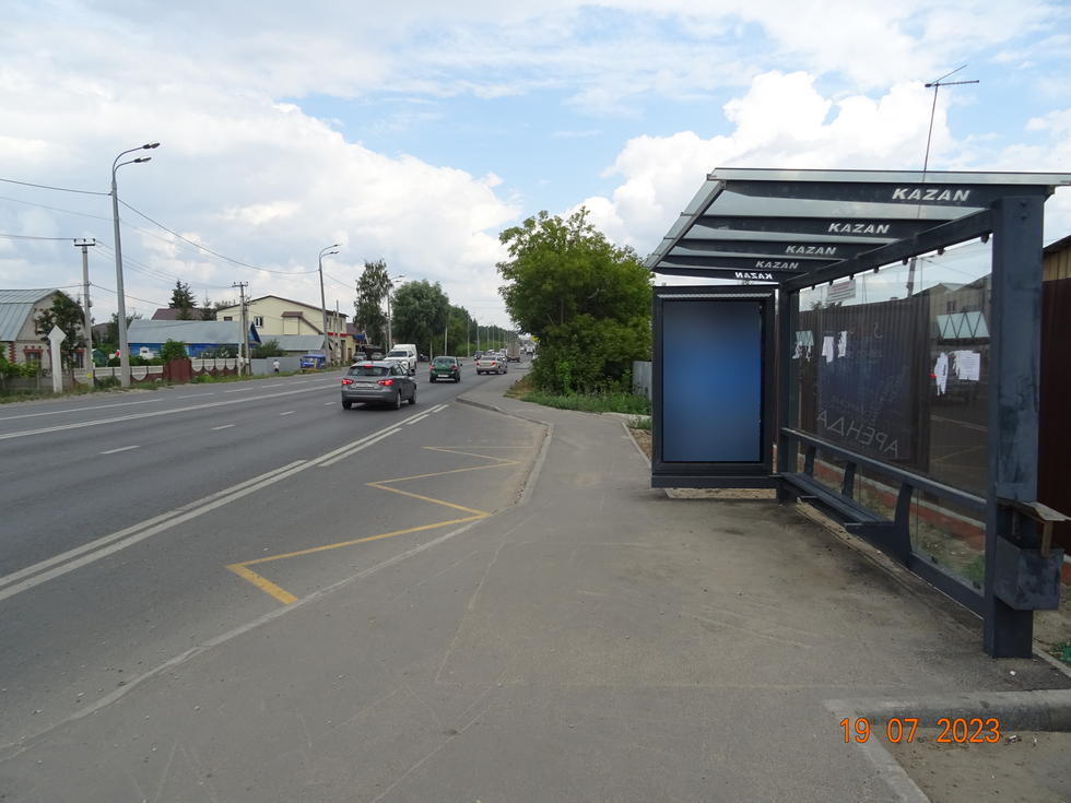 Фотография рекламного носителя, тип: Остановка 1.8x1.2, адрес: Азина ул., д.12, Казань, Республика Татарстан, Россия. Сторона A №1042777
