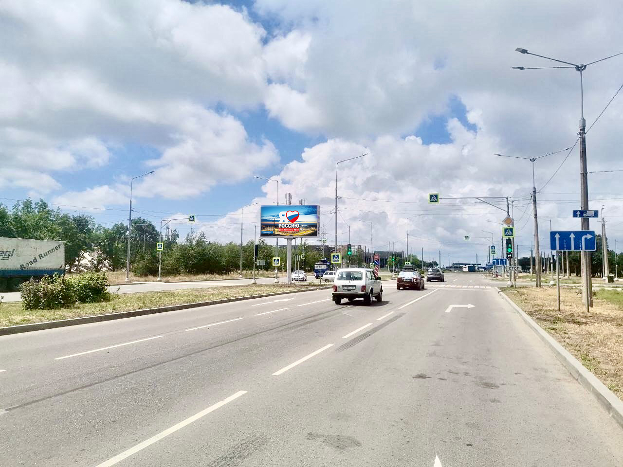 Фотография рекламного носителя, тип: Билборд 3x6, адрес: Шевченко б-р. Х Михаила Грушевского ул., поз.1, Мариуполь, Донецкая область, Россия. Сторона A1-А10 №1097603