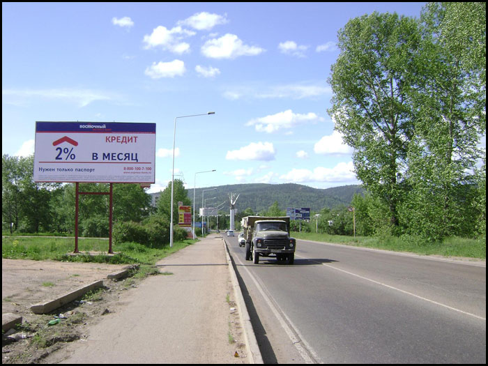 Фотография рекламного носителя, тип: Билборд 3x6, адрес: Зеленогорск г., перед стеллой Три пера, р-н гаражей ЭХЗ, Красноярск, Красноярский край, Россия. Сторона Б №960763
