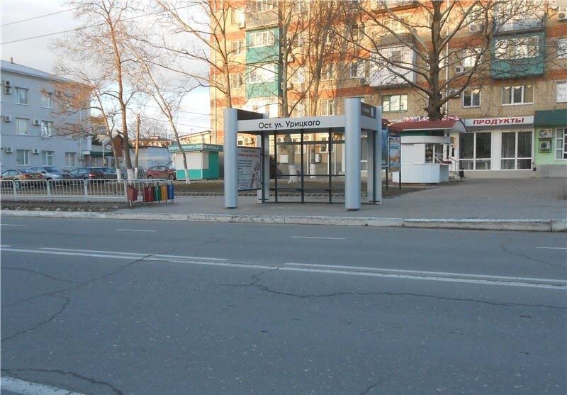 Фотография рекламного носителя, тип: Остановка 1.4x1.6, адрес: Ленина ул., ост. Урицкого, Темрюк, Краснодарский край, Россия. Сторона А №719630