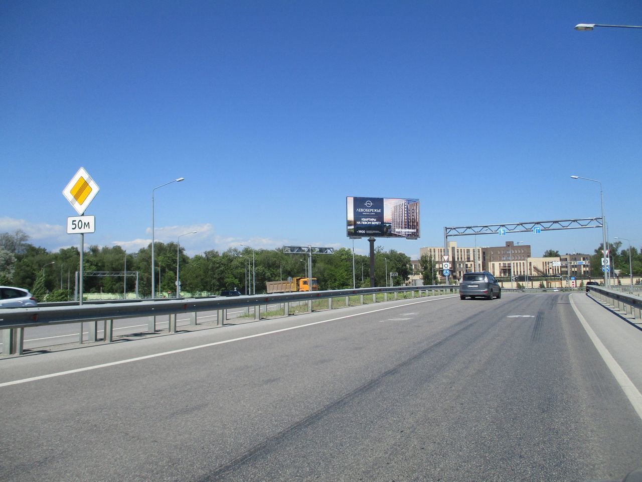 Фотография рекламного носителя, тип: Билборд 3x6, адрес: Левобережная ул. Х Объездная ул., Ростов-на-Дону, Ростовская область, Россия. Сторона Б №946894