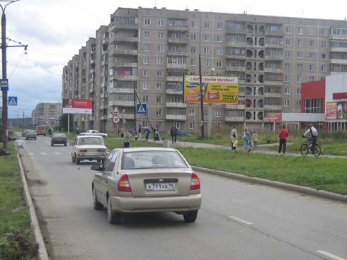 Фотография рекламного носителя, тип: Билборд 3x6, адрес: Уральский пр-т., д.58а, Нижний Тагил, Свердловская область, Россия. Сторона A №484657