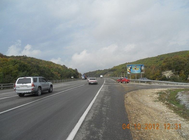 Фотография рекламного носителя, тип: Билборд 3x6, адрес: Новороссийск-Краснодар а/д, за поворотом на Раевскую ст., Новороссийск, Краснодарский край, Россия. Сторона A №1006469