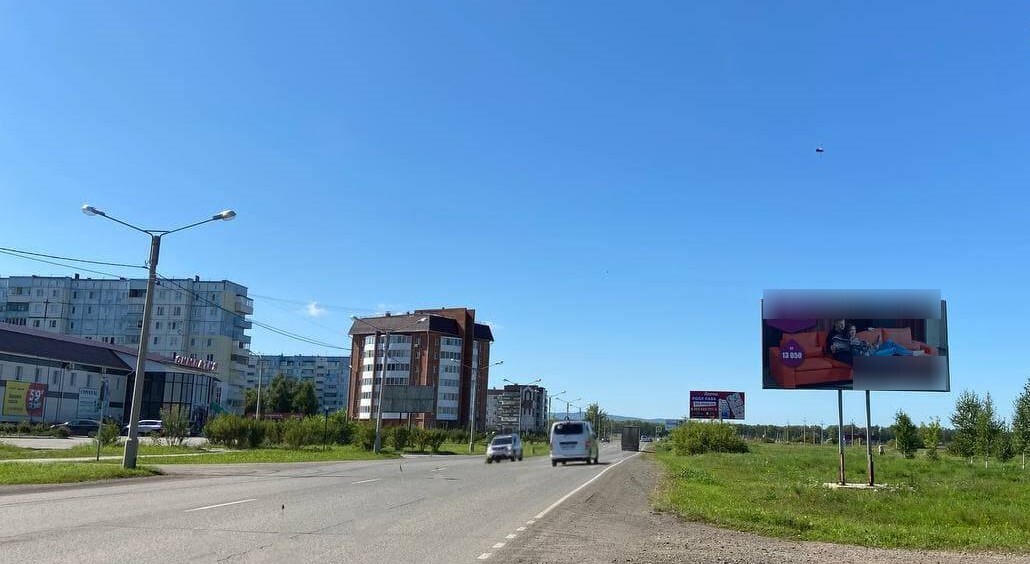 Фотография рекламного носителя, тип: Билборд 3x6, адрес: Шарыпово пос., Комсомольская ул., напротив супермаркета Симпатия, Красноярск, Красноярский край, Россия. Сторона A №588654