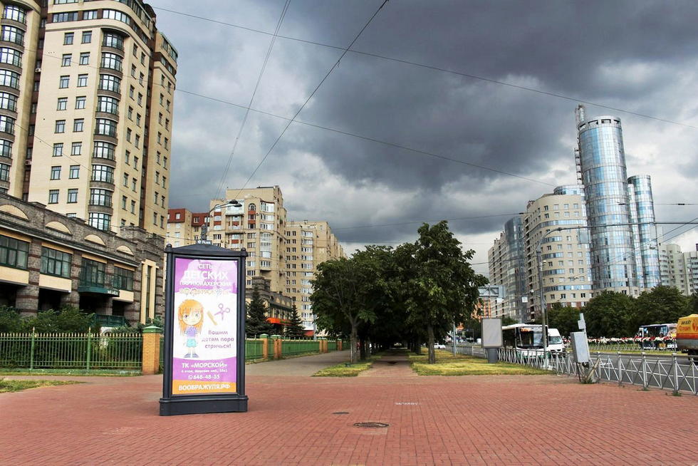 Фотография рекламного носителя, тип: Пиллар 3x1.4, адрес: Нахимова ул., д.15 Х Кораблестроителей ул., Санкт-Петербург, Россия. Сторона Б №724912