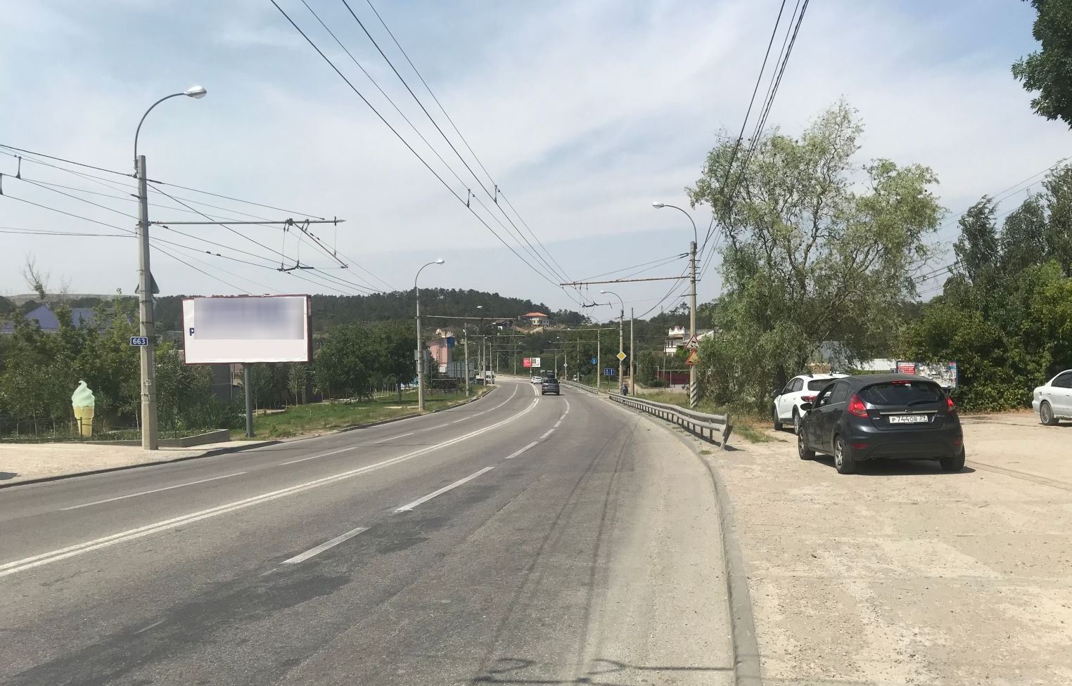 Фотография рекламного носителя, тип: Билборд 3x6, адрес: Лозовое с., 662 950м, Симферополь, Республика Крым, Россия. Сторона B №947389