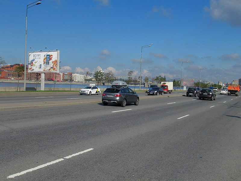 Фотография рекламного носителя, тип: Билборд 3x6, адрес: Малоохтинская наб., д.16, Санкт-Петербург, Россия. Сторона В №639145