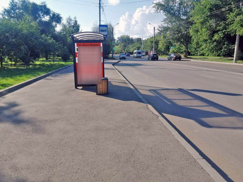 Фотография рекламного носителя, тип: Остановка 1.8x1.2, адрес: Воронова ул., д.10а, ост. "СПТУ-18", поз.1, Красноярск, Красноярский край, Россия. Сторона Б №1046528