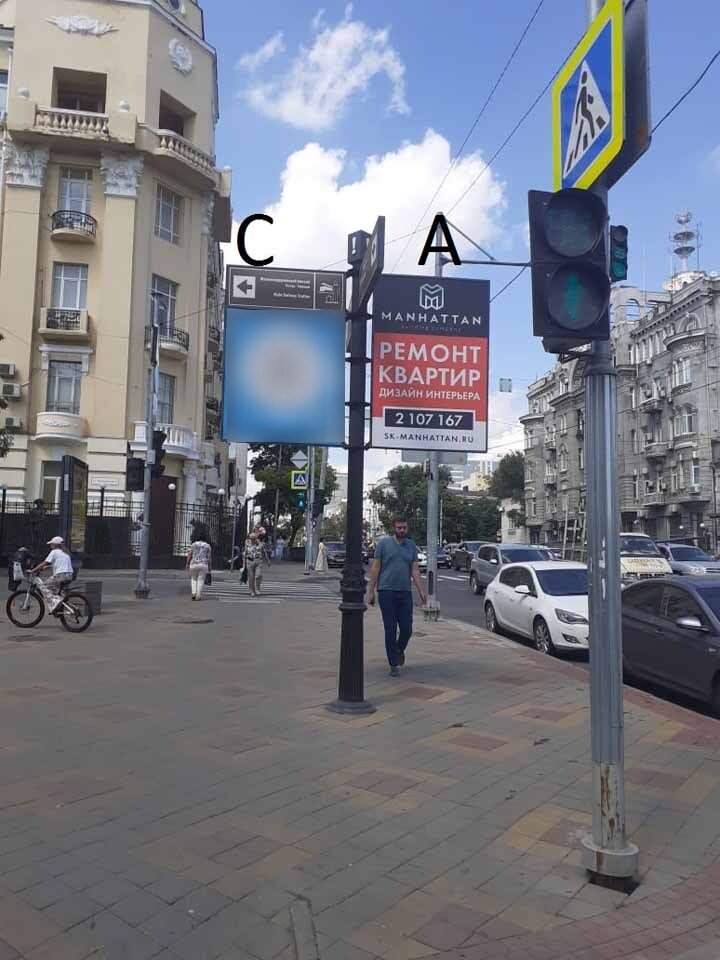 Фотография рекламного носителя, тип: Дорожный указатель, адрес: Пушкинская ул., д.48 X Буденновский пр-т., Ростов-на-Дону, Ростовская область, Россия. Сторона С2 №1087103