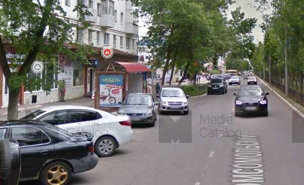 Фотография рекламного носителя, тип: Остановка 1.8x1.2, адрес: Комсомольский пр-т., д.24, Нефтекамск, Республика Башкортостан, Россия. Сторона B2 №1098341