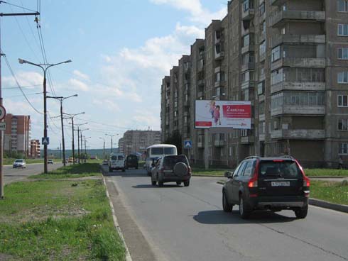 Фотография рекламного носителя, тип: Билборд 3x6, адрес: Уральский пр-т., д.64, Нижний Тагил, Свердловская область, Россия. Сторона A №484659