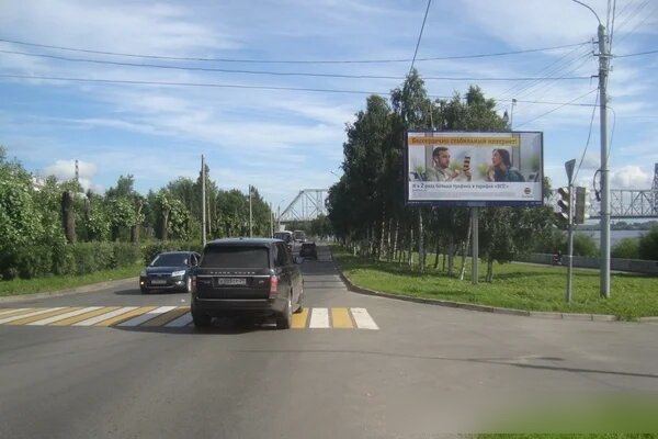 Фотография рекламного носителя, тип: Билборд 3x6, адрес: Наб. Северной Двины ул. Х Урицкого ул., Архангельск, Архангельская область, Россия. Сторона А №765871