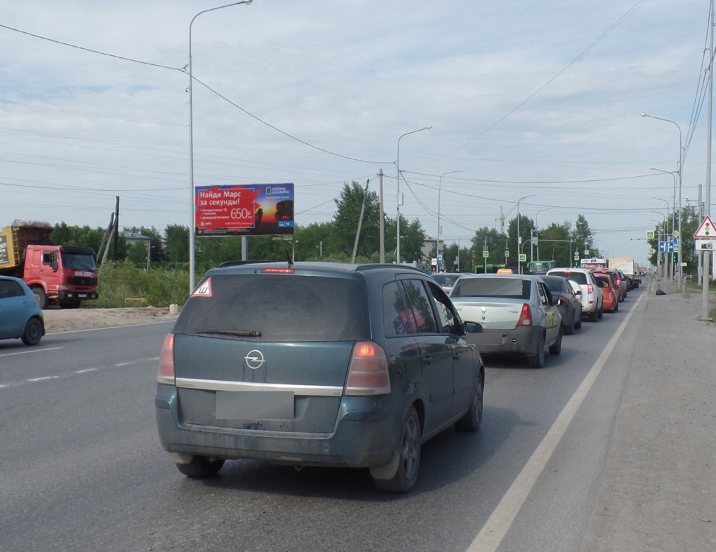 Фотография рекламного носителя, тип: Билборд 3x6, адрес: Щербакова ул., 100м до АЗС Газпромнефть, Тюмень, Тюменская область, Россия. Сторона Б №523655