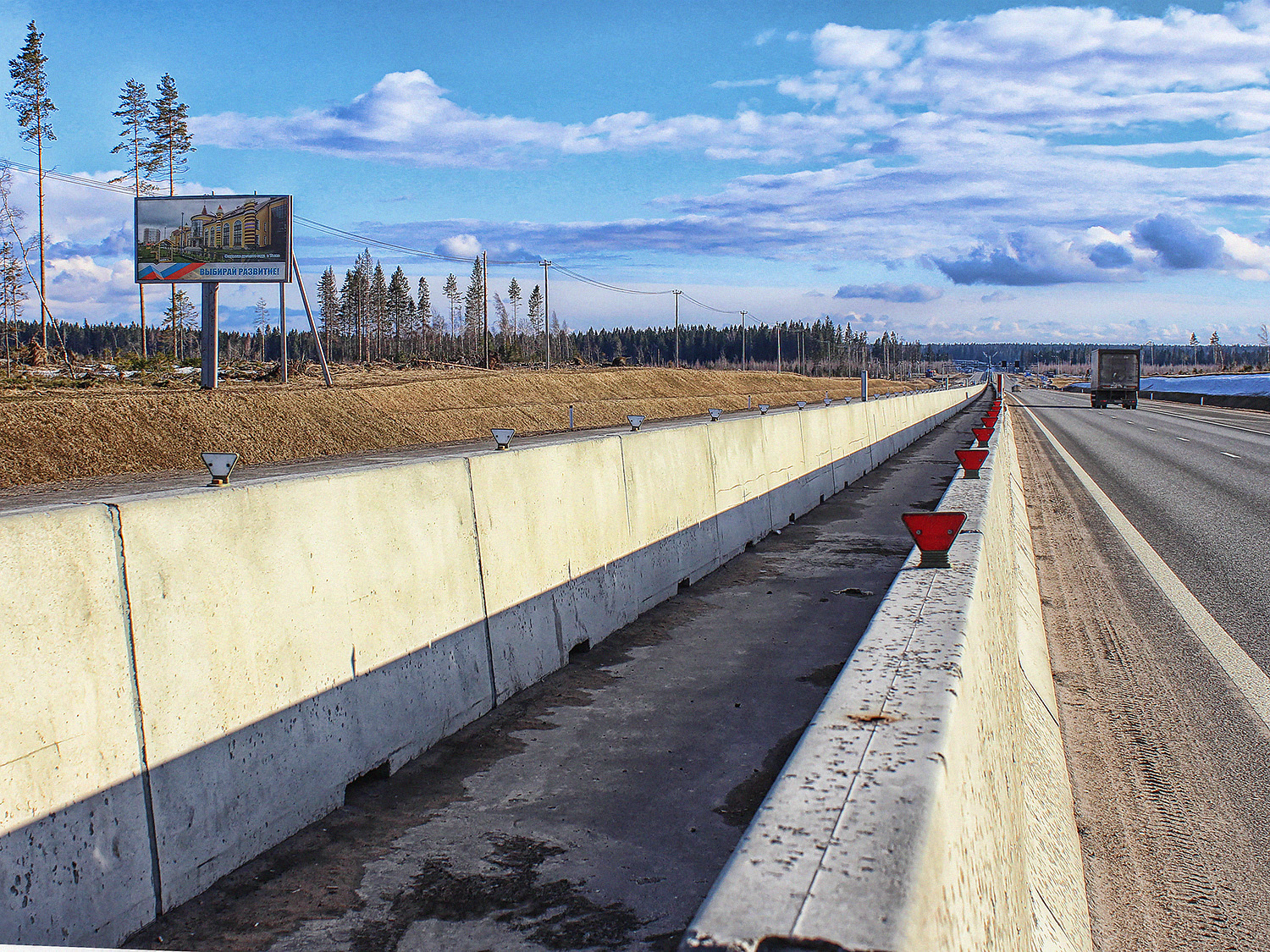Фотография рекламного носителя, тип: Билборд 3x6, адрес: Новоприозерское ш., 48 372м, Ленинградская область, Россия. Сторона Б №628468