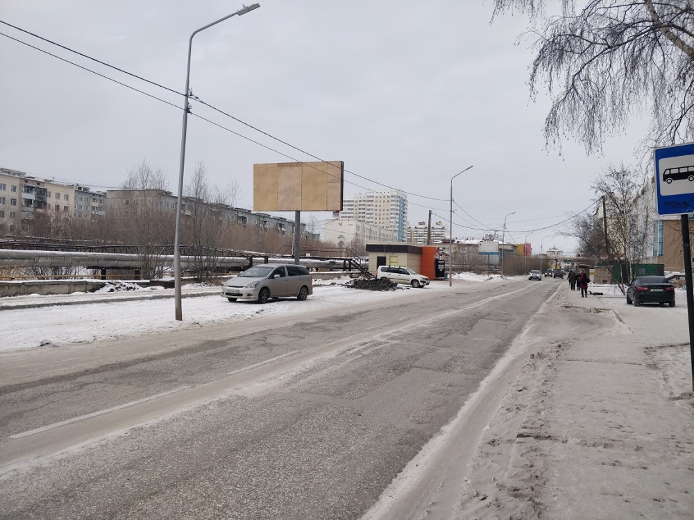 Фотография рекламного носителя, тип: Билборд 3x6, адрес: Губина ул., д.9В, Якутск, Республика Саха (Якутия), Россия. Сторона Б №1054000