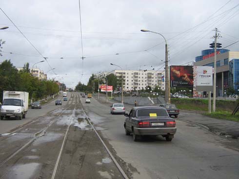 Фотография рекламного носителя, тип: Билборд 3x6, адрес: Фрунзе ул., около моста, Нижний Тагил, Свердловская область, Россия. Сторона A №483675