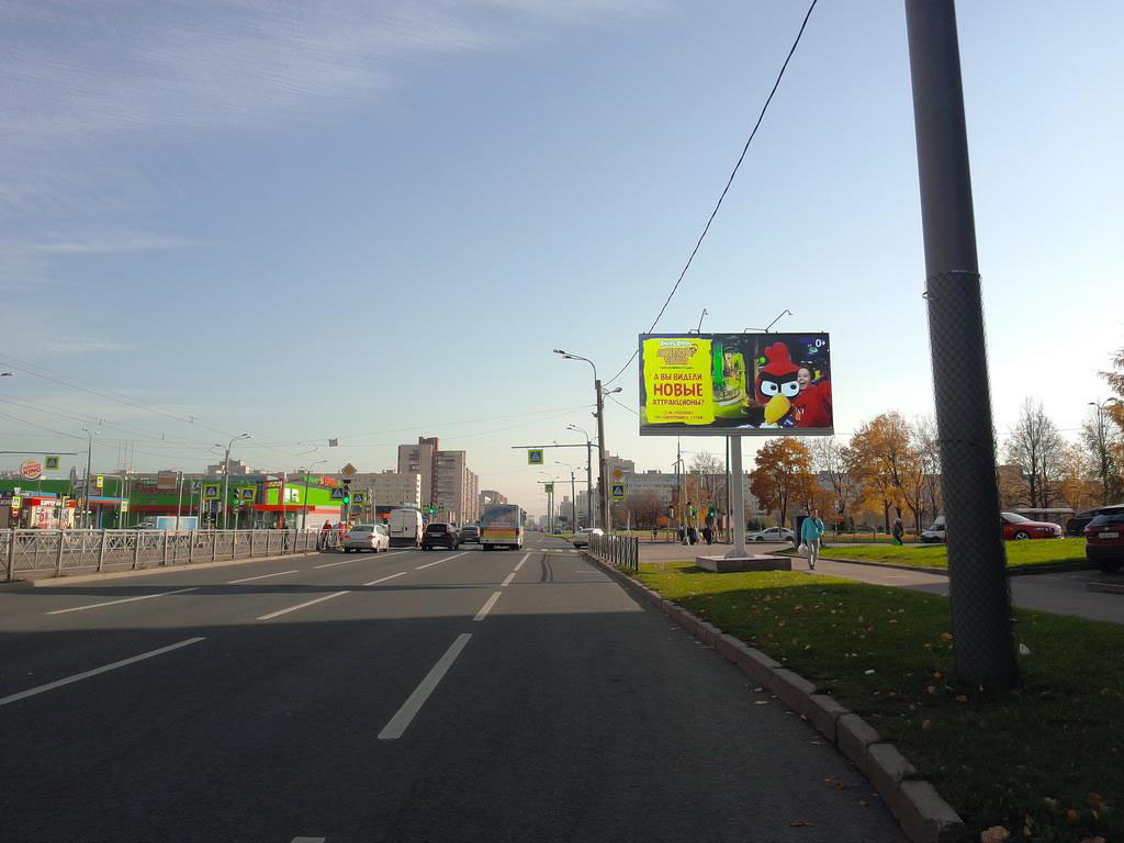 Фотография рекламного носителя, тип: Билборд 3x6, адрес: Просвещения пр-т., д.53, корп.1 Х Демьяна Бедного ул., Санкт-Петербург, Россия. Сторона Аh1-Аh4 №992926