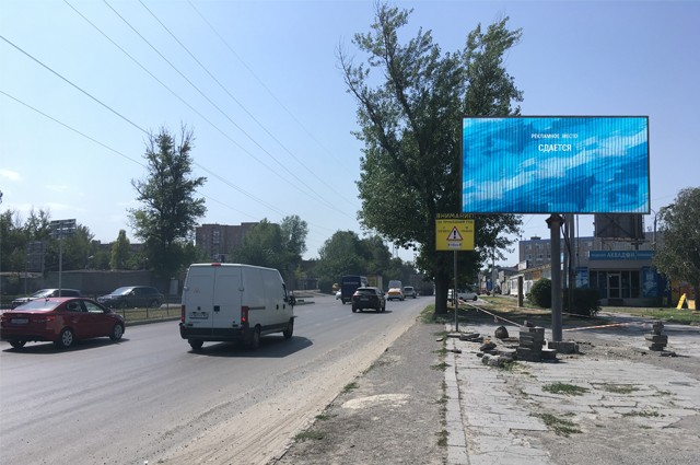 Фотография рекламного носителя, тип: Билборд 3x6, адрес: Малиновского ул. Х Стачки пр-т., д.243, Ростов-на-Дону, Ростовская область, Россия. Сторона А №781751