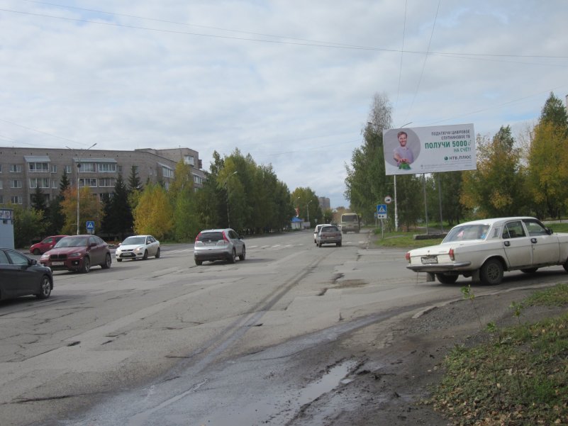 Фотография рекламного носителя, тип: Билборд 3x6, адрес: Назарово г., Арбузова ул., д.11, Красноярск, Красноярский край, Россия. Сторона A №960862