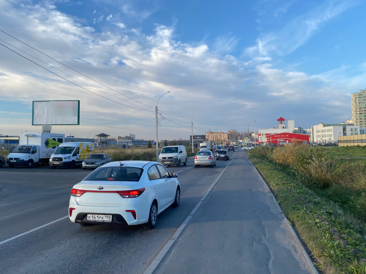 Фотография рекламного носителя, тип: Билборд 3x6, адрес: Кудрово г., Центральная ул. Х Промышленная ул., Ленинградская область, Россия. Сторона Б №961345