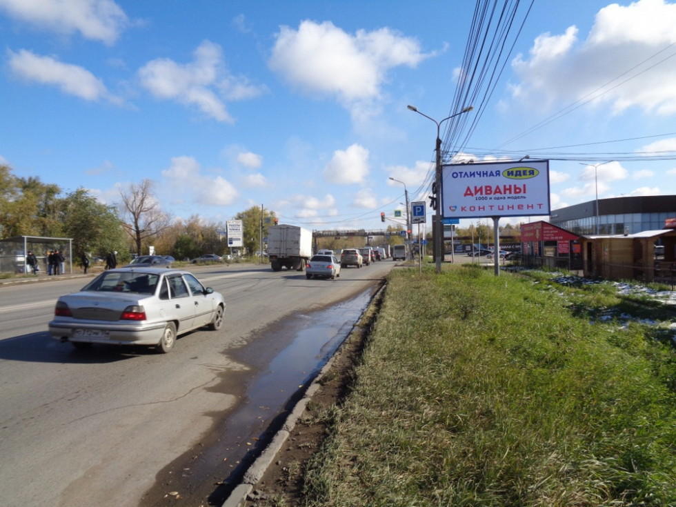 Фотография рекламного носителя, тип: Билборд 3x6, адрес: 10 лет Октября ул., д.182, поз.1, Омск, Омская область, Россия. Сторона А №1010013