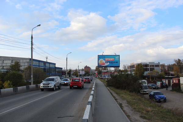 Фотография рекламного носителя, тип: Билборд 3x6, адрес: Ушаковская ул. Х Средне-Ушаковский мост, Иркутск, Иркутская область, Россия. Сторона А №1058117