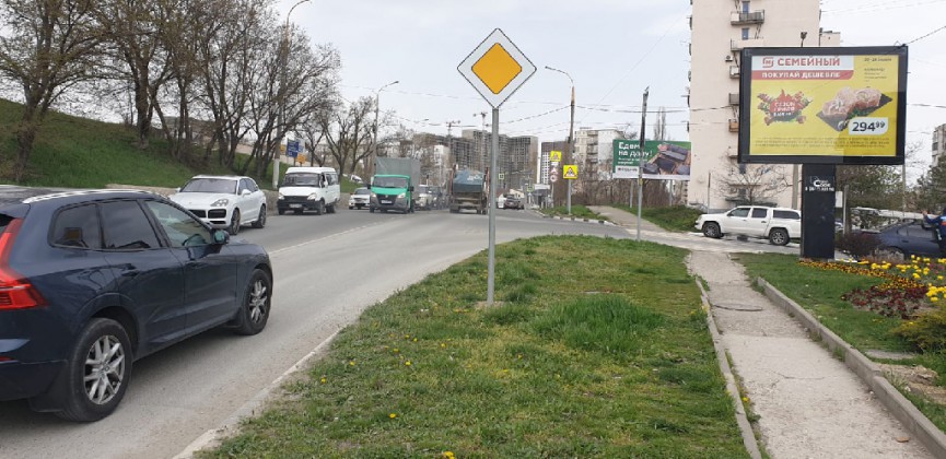 Фотография рекламного носителя, тип: Ситиборд 2.7x3.7, адрес: Волгоградская ул., д.1 X Мысхакское ш., Новороссийск, Краснодарский край, Россия. Сторона A1-A5 №1071982