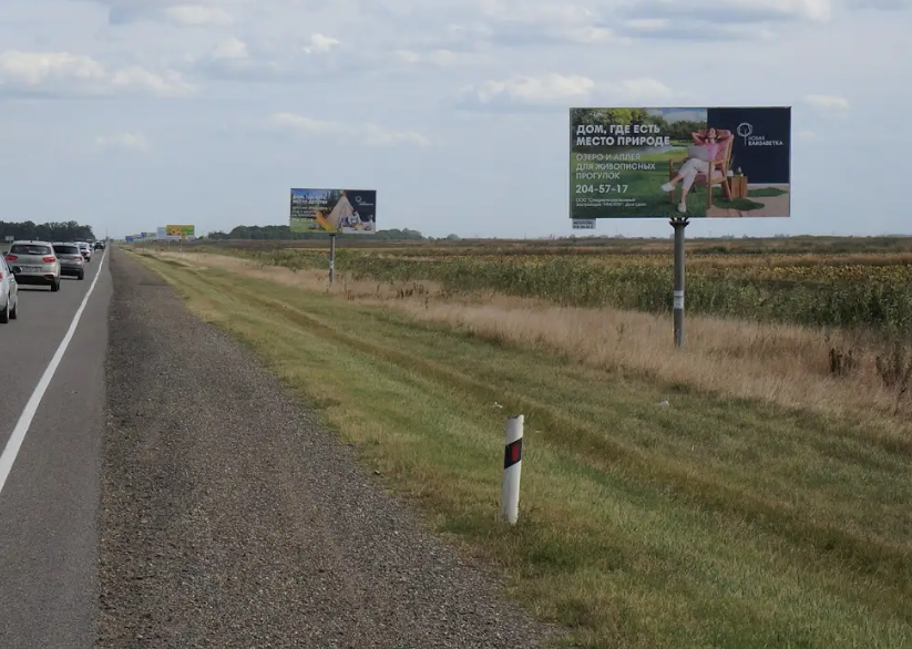 Фотография рекламного носителя, тип: Билборд 3x6, адрес: Краснодар - Славянск-на-Кубани - Крым а/д., 21 595м, Краснодар, Краснодарский край, Россия. Сторона А №1028169