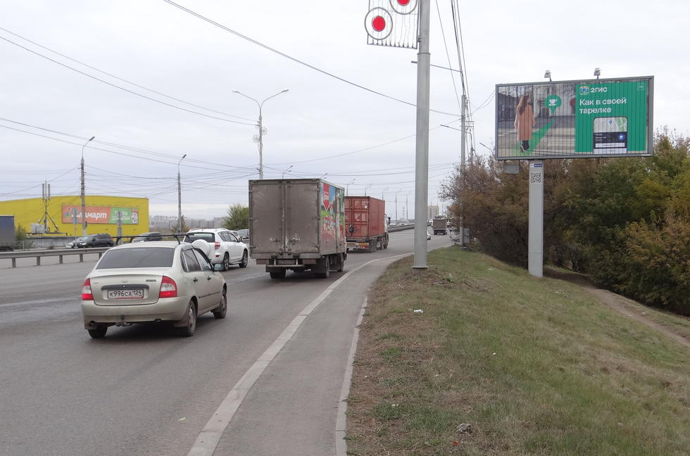 Фотография рекламного носителя, тип: Билборд 3x6, адрес: Октябрьский мост, 90м до мостового сооружения, Красноярск, Красноярский край, Россия. Сторона А1-A3 №534675