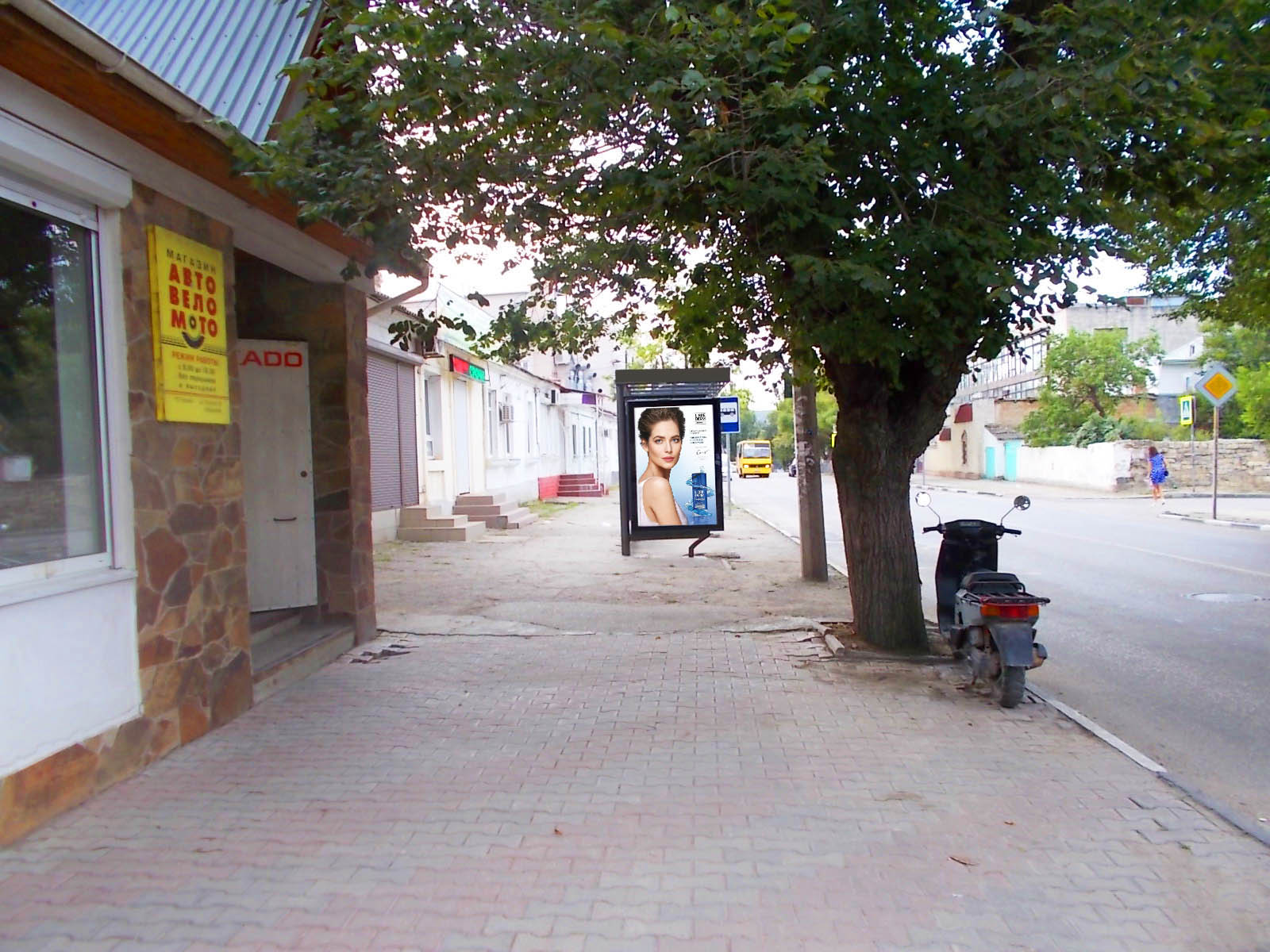 Фотография рекламного носителя, тип: Остановка 1.8x1.2, адрес: Русская ул., д.18, Феодосия, Республика Крым, Россия. Сторона B1 №843681